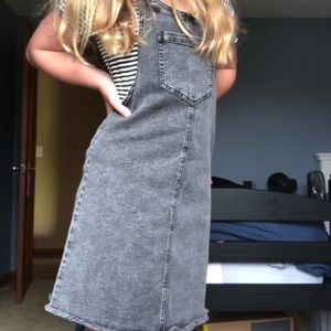 This is a black denim dress from target in kids